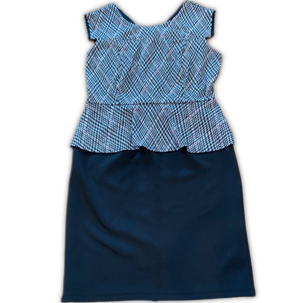 Enfocus Studio peplum style sleeveless dress with black skirt and plaid bodice